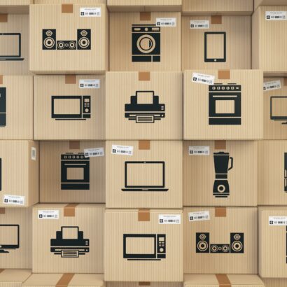 Household kitchen appliances and home electronics in boxes . E-c
